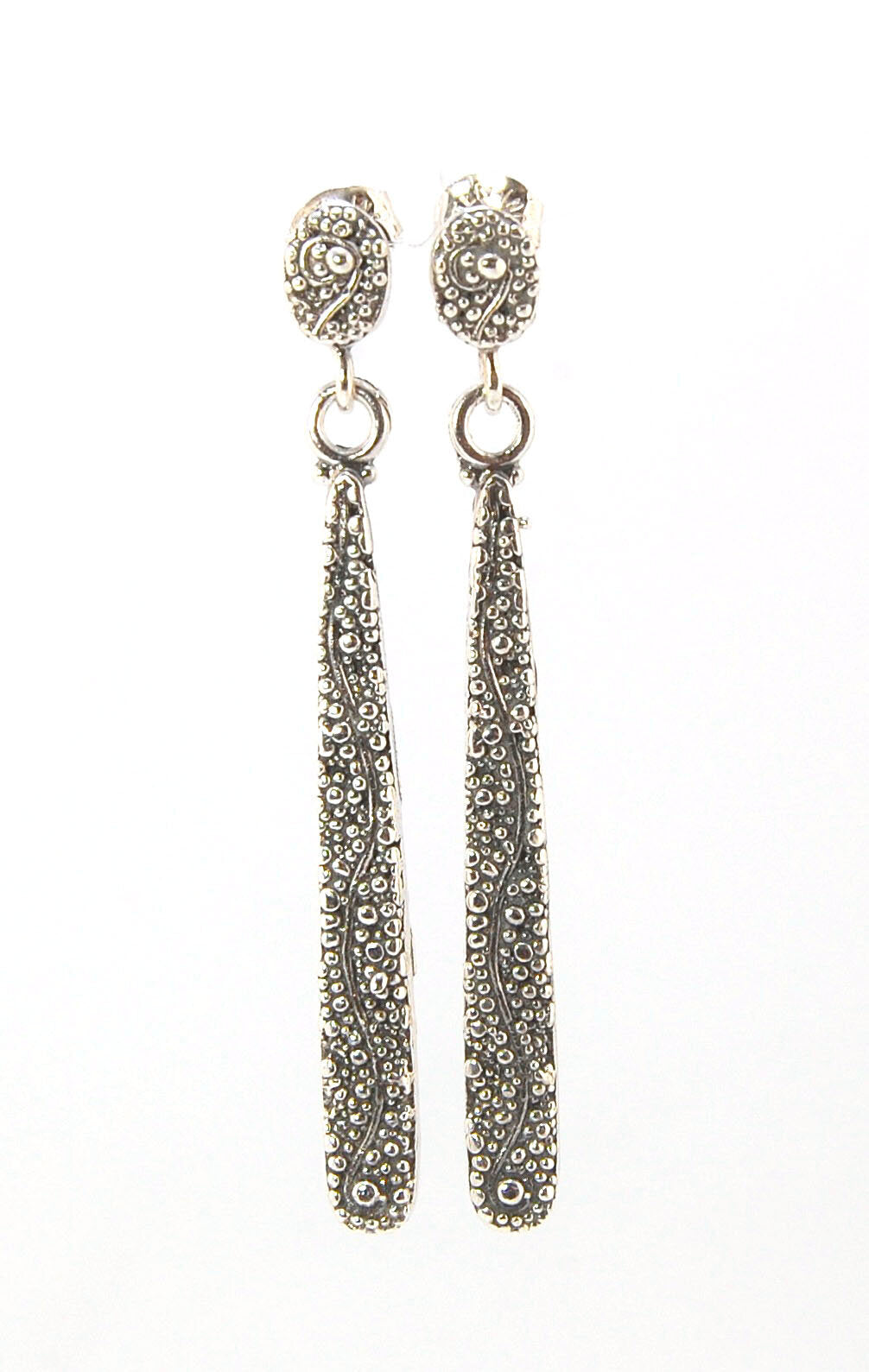 Seaweed Long Dangle Post Earrings These seaweed Post dangle earrings are cast versions of my original granulation work. Once the original work is made using the ancient technique of granulation, it is then molded for repeat waxes and then cast using the L