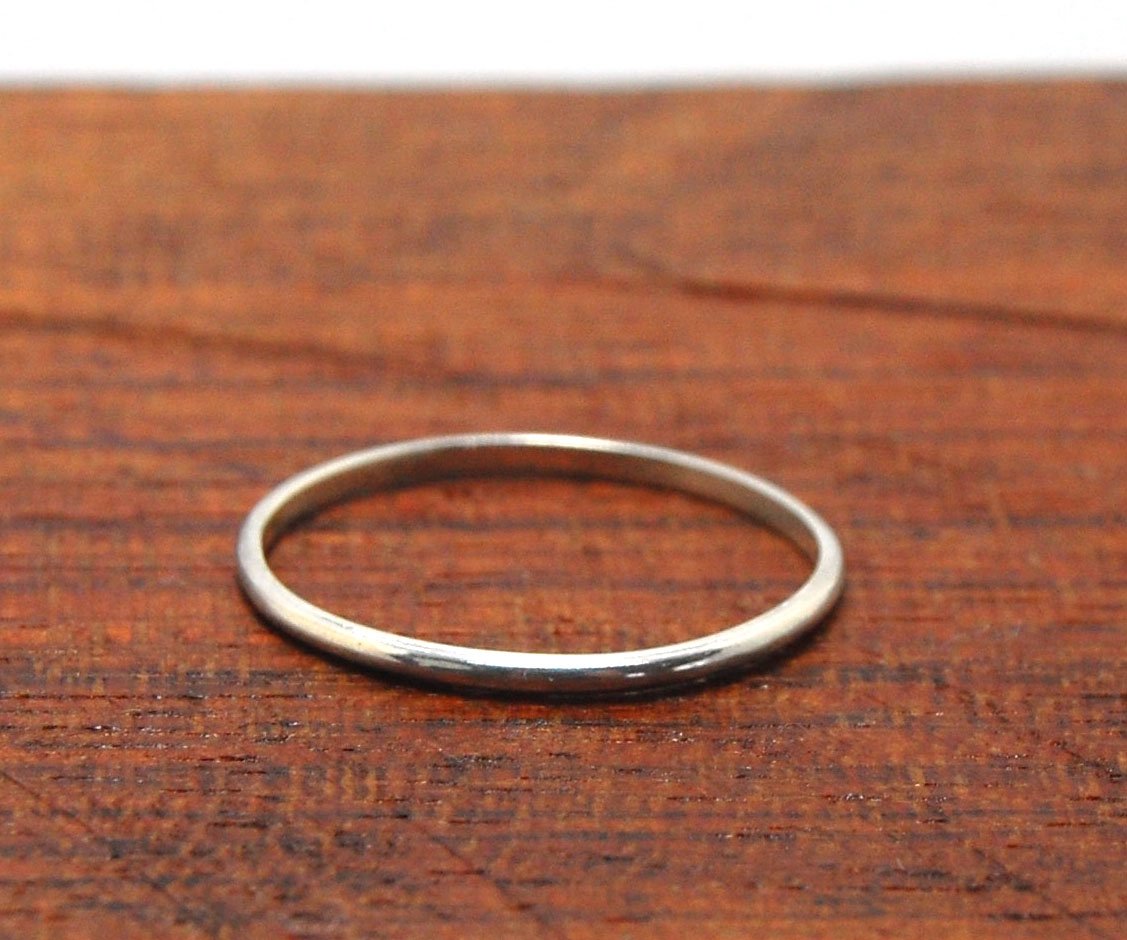 Superthin Half Round Plain Band - 1.3mm x 1mm wide in Gold or Silver Let me make you a ring! This half round plain band is milled in my studio and hand finished to your specificiations.This half round band ring is pictured in sterling silver, but can be m