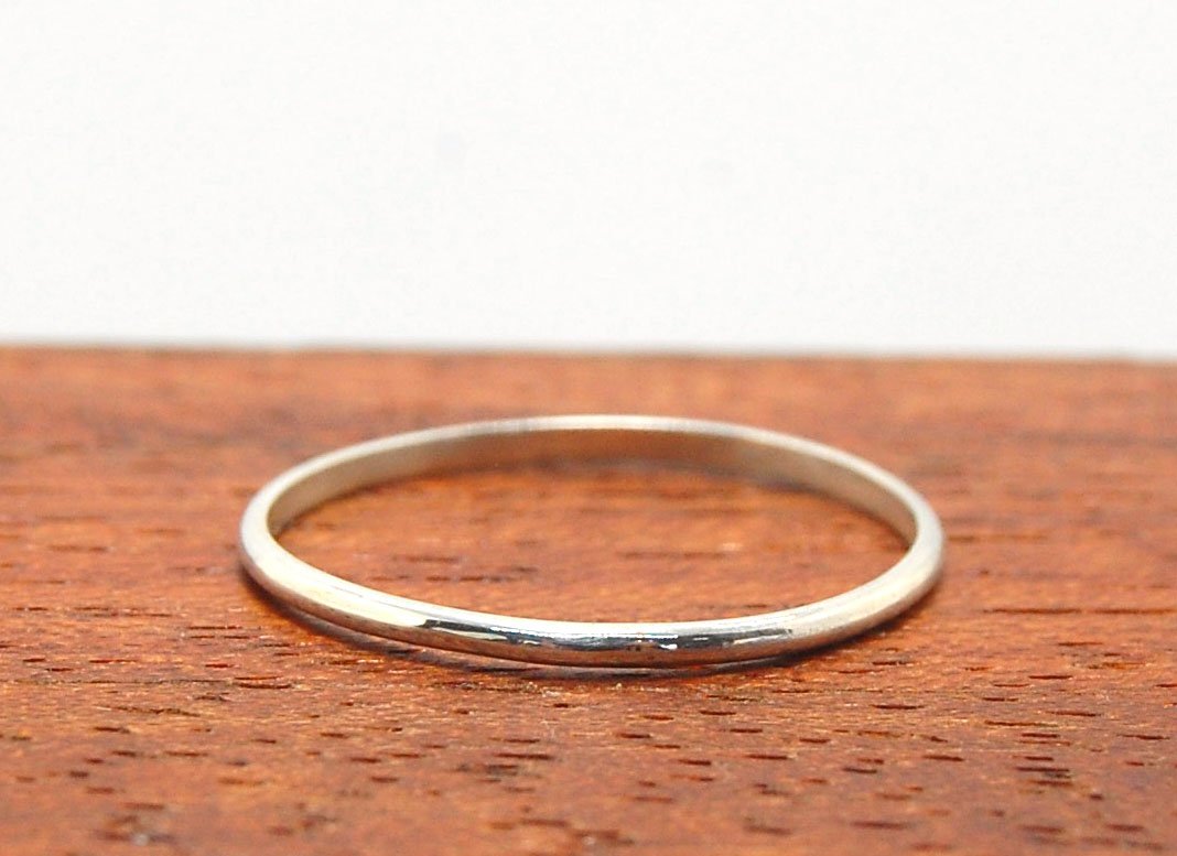 Superthin Half Round Plain Band - 1.3mm x 1mm wide in Gold or Silver Let me make you a ring! This half round plain band is milled in my studio and hand finished to your specificiations.This half round band ring is pictured in sterling silver, but can be m