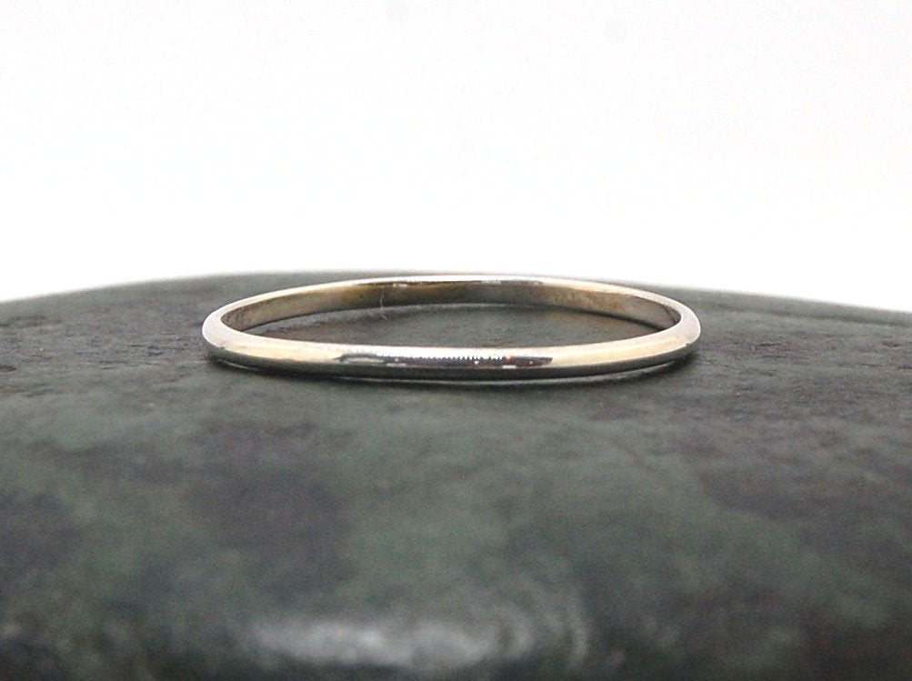 Thin Half Round Plain Band - 1.8mm wide x 1mm thick in Gold or Silver Let me make you a ring!This half round plain band is milled in my studio and hand finished to your specifications in the metal of your choice.This half round band ring is pictured in st