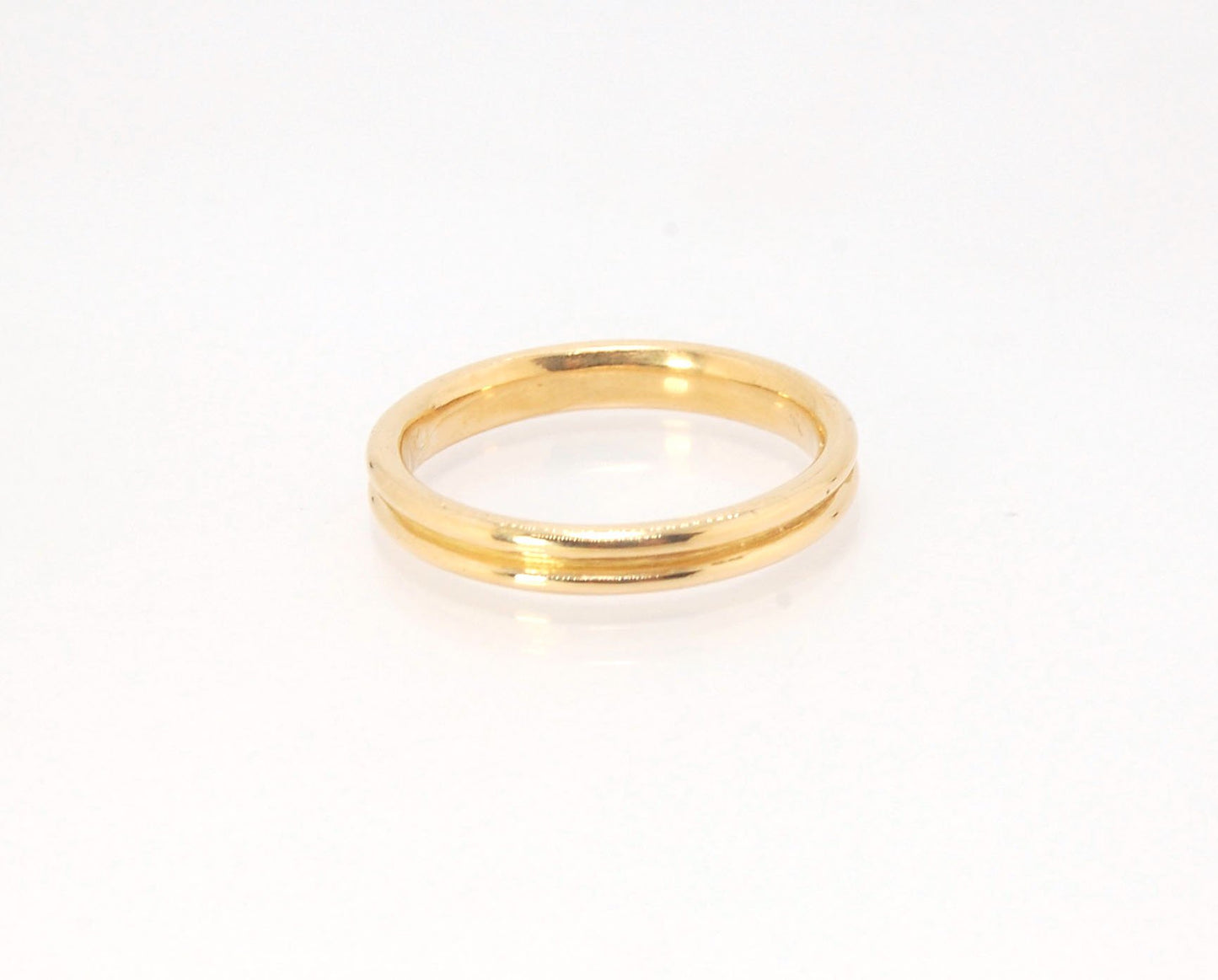 2 Rim 3.3mm Wide Band - Sterling silver, 14k or 18k yellow gold This is a narrow, 3.3mm, 2 rim band cast from a wax carving turned on a lathe. These are so much fun to make and I have several variations of different rims and widths available. I then take