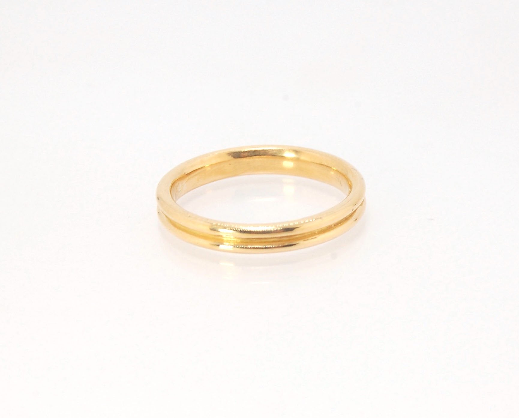 2 Rim 3.3mm Wide Band - Sterling silver, 14k or 18k yellow gold This is a narrow, 3.3mm, 2 rim band cast from a wax carving turned on a lathe. These are so much fun to make and I have several variations of different rims and widths available. I then take