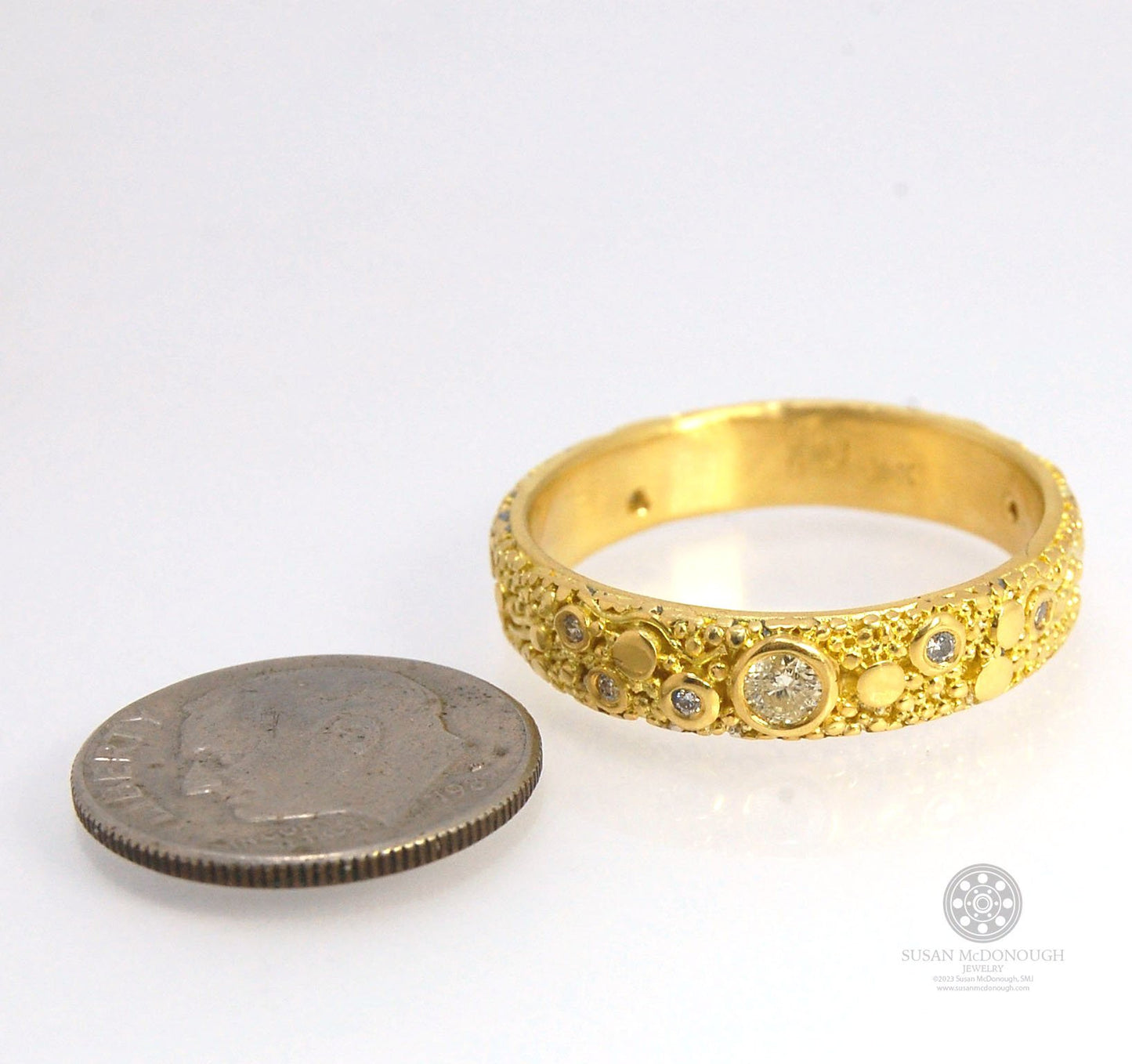 Balance and Flow Band 18k Granulation with 9 Diamonds - Made to Order This is a one-of-a-kind 18k gold and Diamond band made special just for you! The pattern is a balance of twining lines and granules and slices of cylinder ingots to make settings for ni