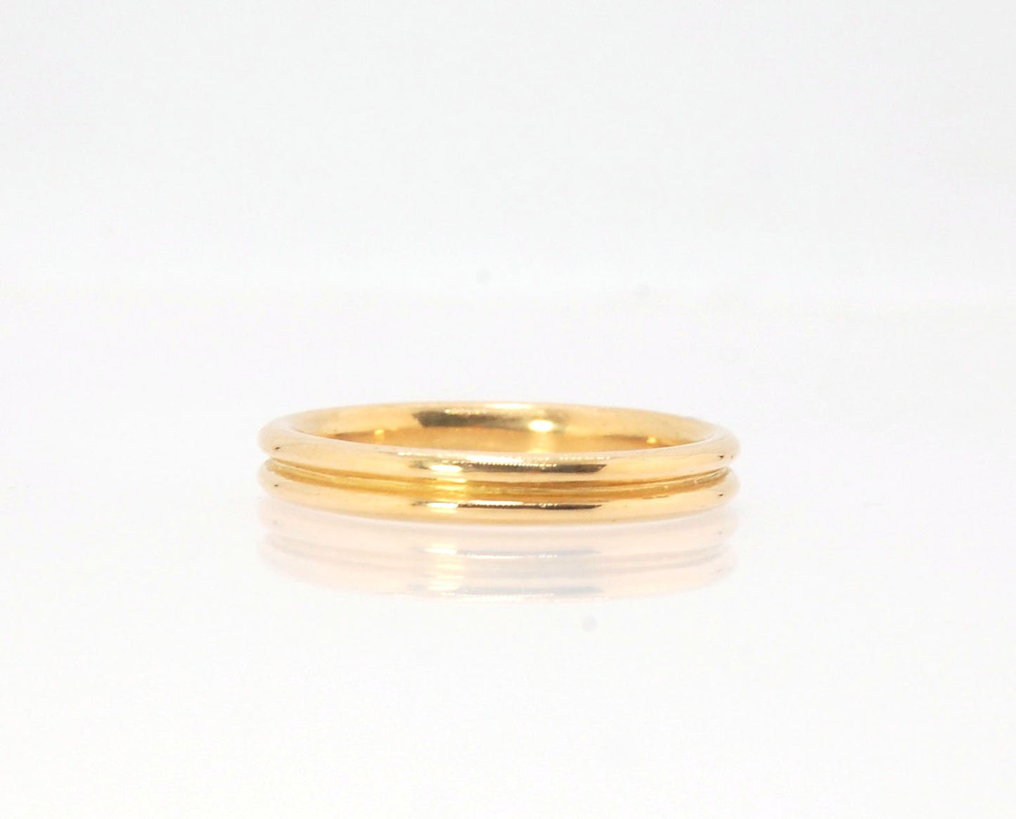 2 Rim 3.3mm Wide Band - Sterling silver, 14k or 18k yellow gold This is a narrow, 3.3mm, 2 rim band cast from a wax carving turned on a lathe. These are so much fun to make and I have several variations of different rims and widths available. I then take