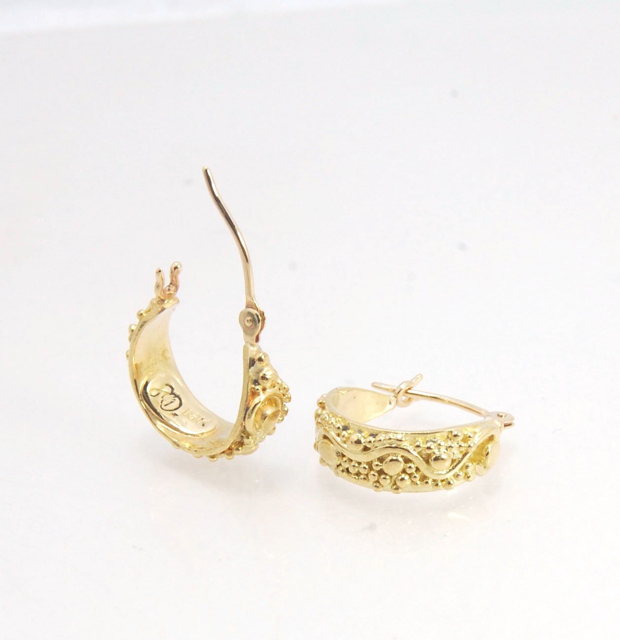 18k Green Gold Starry Night Hoops These are super sweet one of a kind granulated hoops in small batch alloyed Green 18k Gold Granulation. They are a perfect size to wear all the time! The granulation pattern has an undulating line with large and small gra