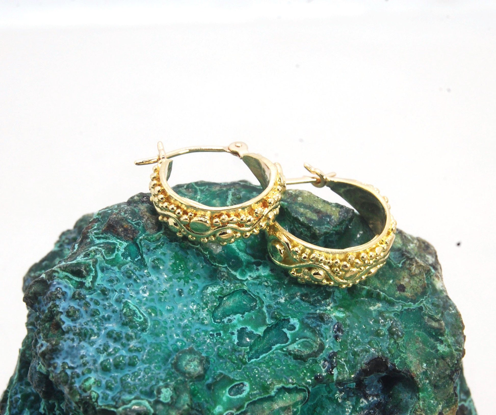 18k Green Gold Starry Night Hoops These are super sweet one of a kind granulated hoops in small batch alloyed Green 18k Gold Granulation. They are a perfect size to wear all the time! The granulation pattern has an undulating line with large and small gra