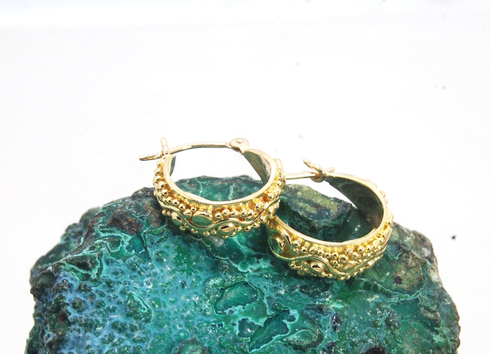 18k Green Gold Starry Night Hoops These are super sweet one of a kind granulated hoops in small batch alloyed Green 18k Gold Granulation. They are a perfect size to wear all the time! The granulation pattern has an undulating line with large and small gra