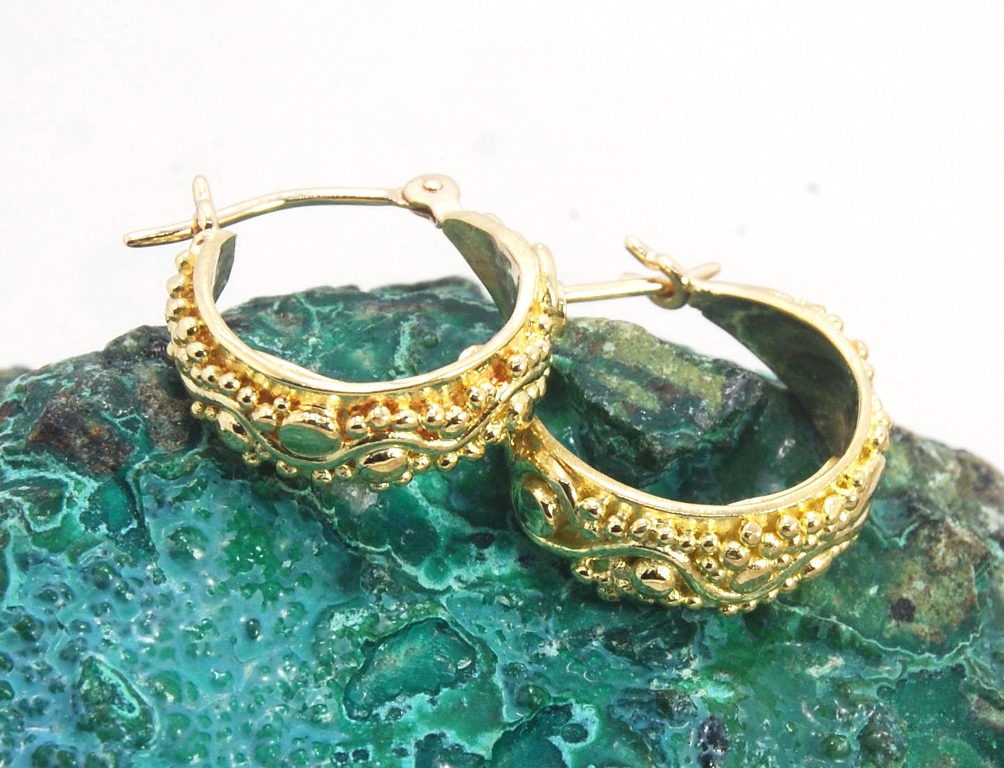 18k Green Gold Starry Night Hoops These are super sweet one of a kind granulated hoops in small batch alloyed Green 18k Gold Granulation. They are a perfect size to wear all the time! The granulation pattern has an undulating line with large and small gra