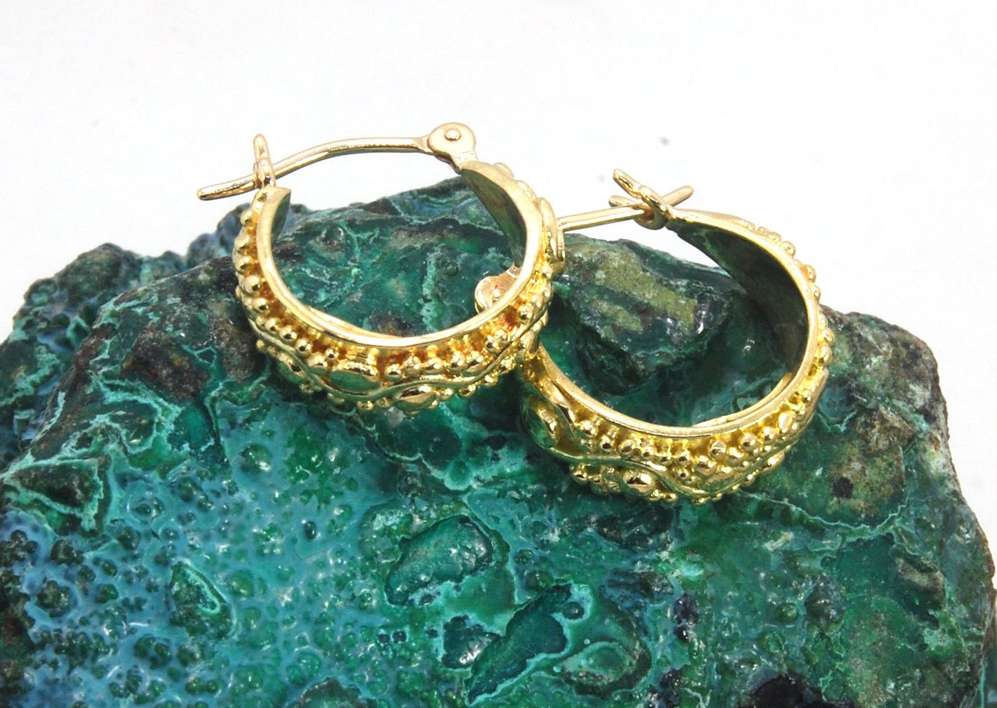 18k Green Gold Starry Night Hoops These are super sweet one of a kind granulated hoops in small batch alloyed Green 18k Gold Granulation. They are a perfect size to wear all the time! The granulation pattern has an undulating line with large and small gra