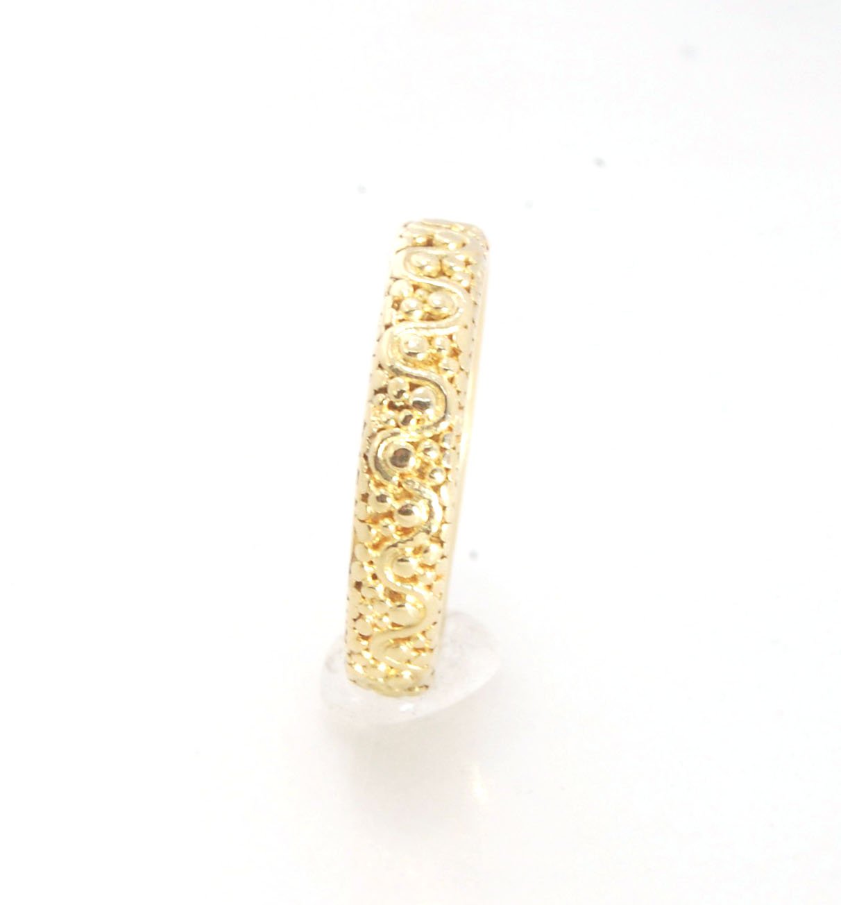 Squiggle and Dot Granulated Ring in Fine Silver or 18k Gold This lovely Squiggle and Dot design band is unique and made by hand using the ancient process of Granulation. Granulation is a controlled fusing process utilized for thousands of years which can