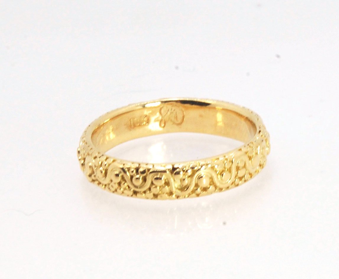 Squiggle and Dot Granulated Ring in Fine Silver or 18k Gold This lovely Squiggle and Dot design band is unique and made by hand using the ancient process of Granulation. Granulation is a controlled fusing process utilized for thousands of years which can