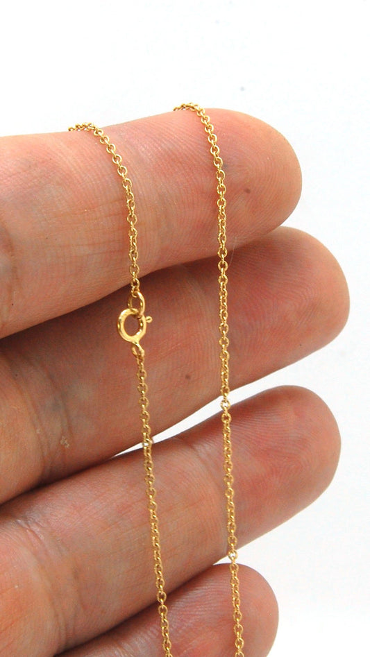 1mm Cable Chain - 14k Yellow gold in 16'/18"/20"/24" Are you looking for a more delicate chain for your handmade pendant? This one might be just the one. With a delicate look at 1mm wide, but a secure make and classic, understated design to compliment you