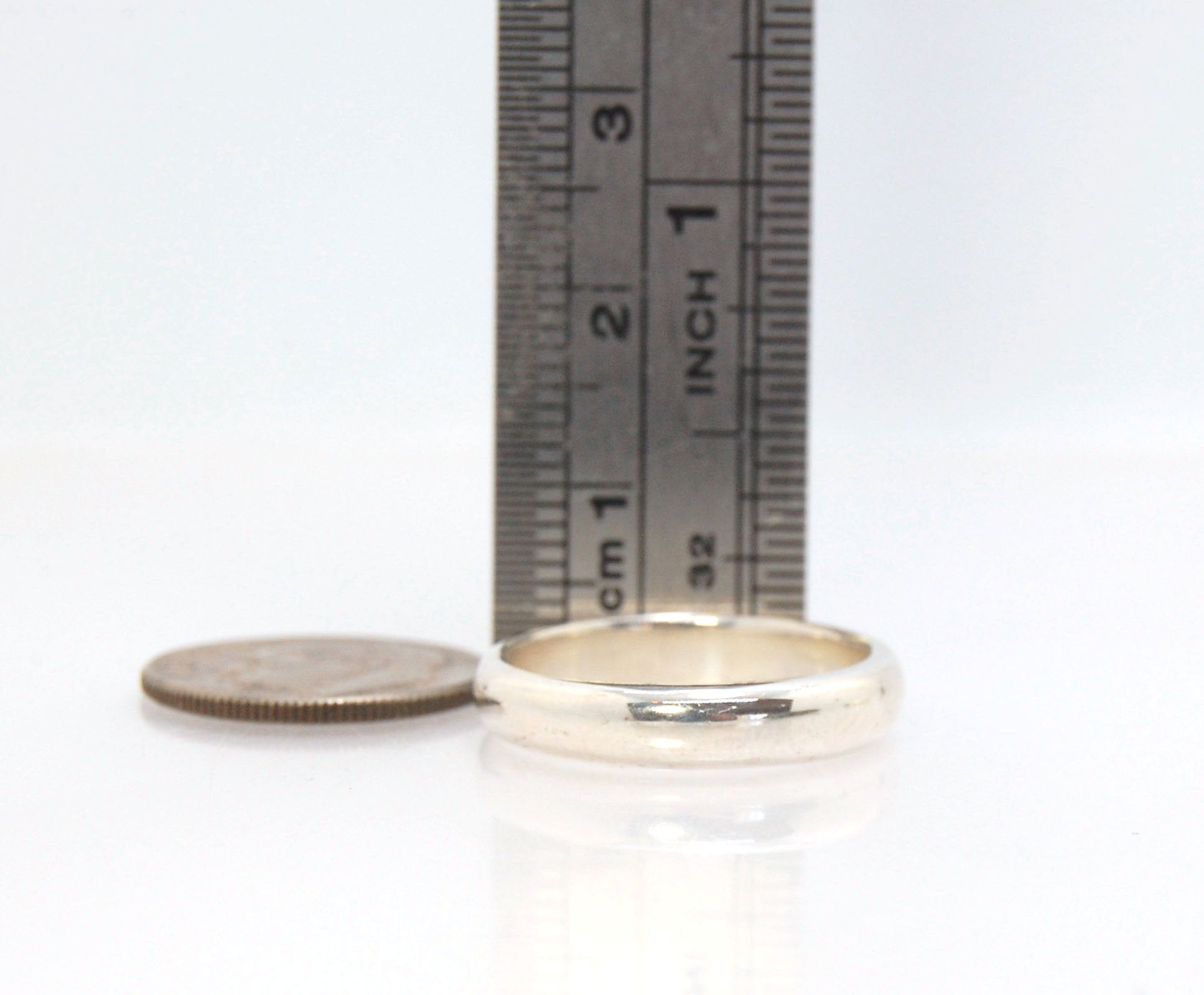 3mm Half Round Plain Band - 3mm wide x 1.5mm thick - in Gold or Silver This half round plain band is milled in my studio and hand finished to your specifications. 3mm wide x 1.5 mm thick. This half round band ring is pictured in sterling silver, but can b