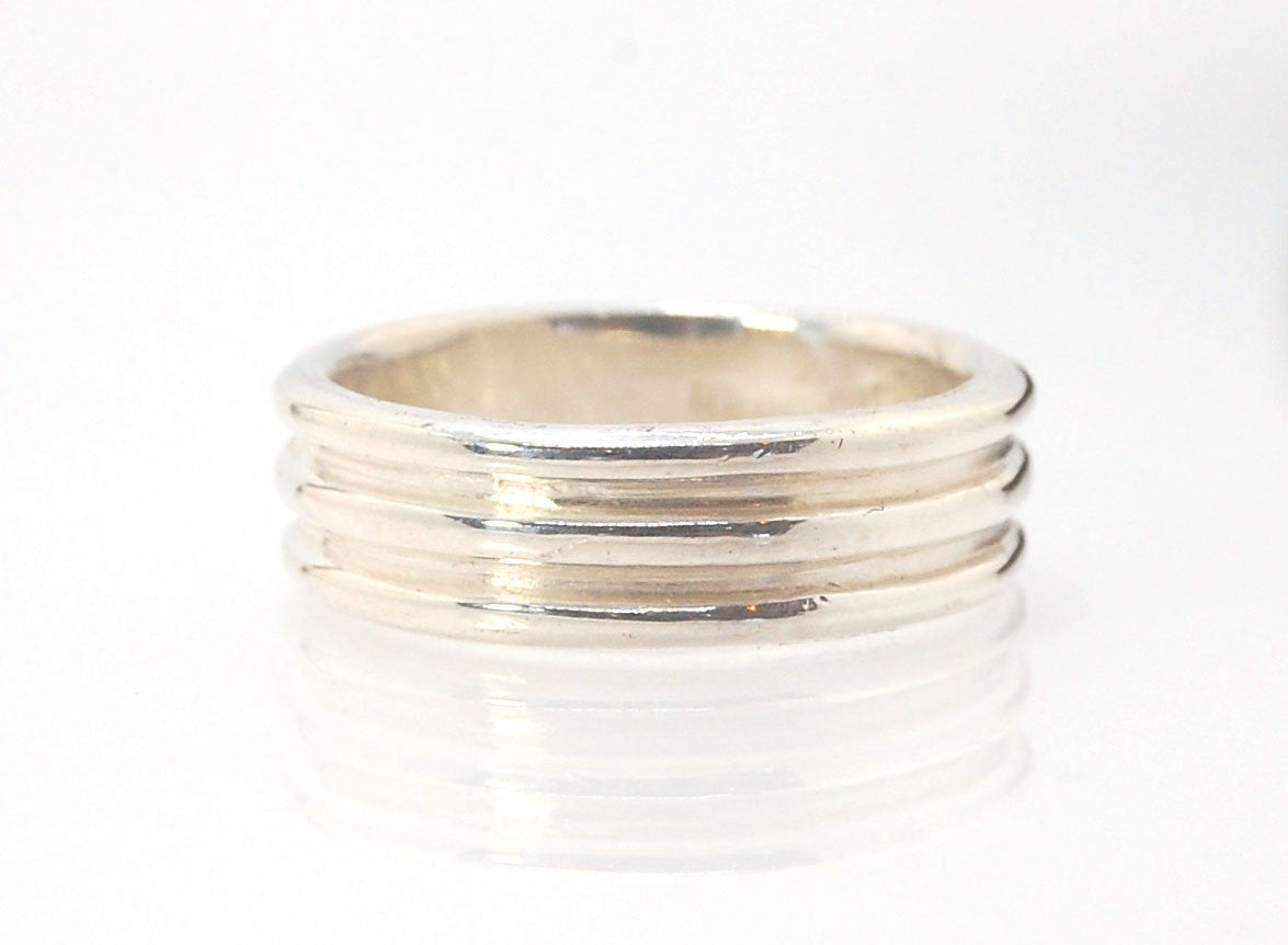 3 Rim Band -6.2mm wide - Sterling silver, 14k or 18k yellow gold This is a 3 rim band cast from a wax carving turned on a lathe and cast using the lost wax process. These are so much fun to make and I have several variations of different rims and widths a