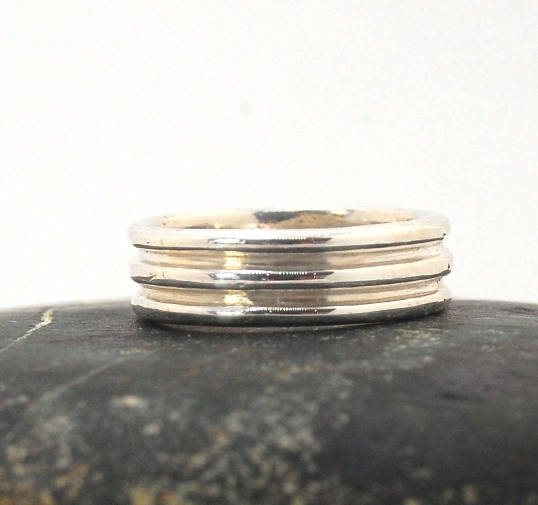 3 Rim Band -6.2mm wide - Sterling silver, 14k or 18k yellow gold This is a 3 rim band cast from a wax carving turned on a lathe and cast using the lost wax process. These are so much fun to make and I have several variations of different rims and widths a