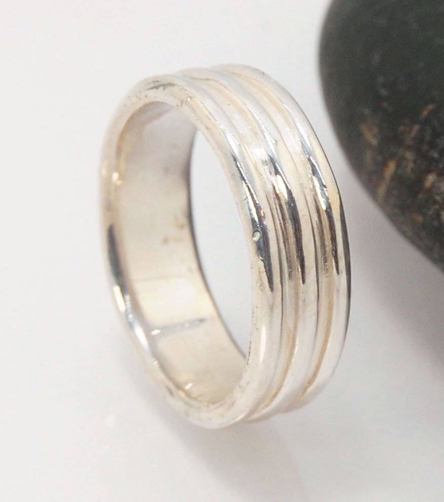 3 Rim Band -6.2mm wide - Sterling silver, 14k or 18k yellow gold This is a 3 rim band cast from a wax carving turned on a lathe and cast using the lost wax process. These are so much fun to make and I have several variations of different rims and widths a