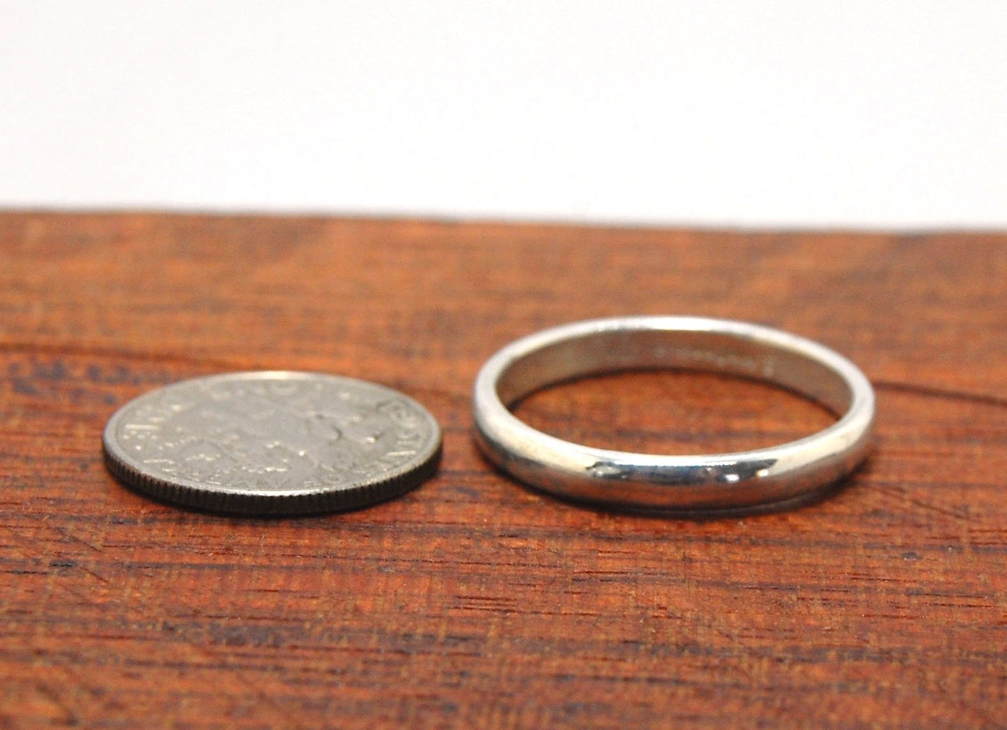 3mm Half Round Plain Band - 3mm wide x 1.5mm thick - in Gold or Silver This half round plain band is milled in my studio and hand finished to your specifications. 3mm wide x 1.5 mm thick. This half round band ring is pictured in sterling silver, but can b