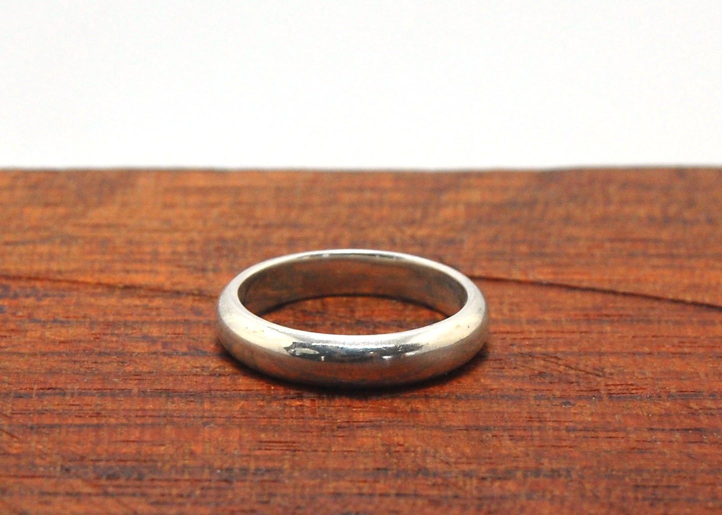 4mm Half Round Plain Band - 4mm wide x 1.8mm thick in Gold or Silver This half-round plain band is milled in my studio and hand-finished to your specifications. 4mm wide x 1.8 mm thick. This half-round band ring is pictured in sterling silver but can be c