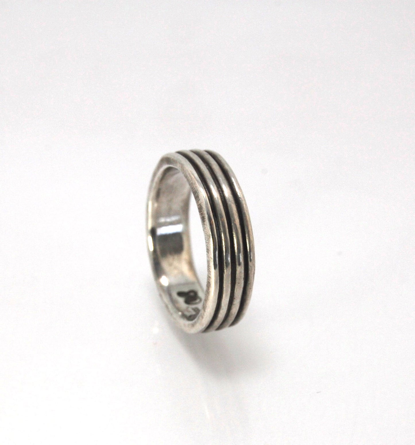 4 Rim Heavy Band 6mm wide - in Gold or Silver This is a heavy band cast from a wax carving turned on a lathe. These are so much fun to make! I have several different variations of this design.6mm wide and 2 mm thickThis ring is pictured in sterling silver