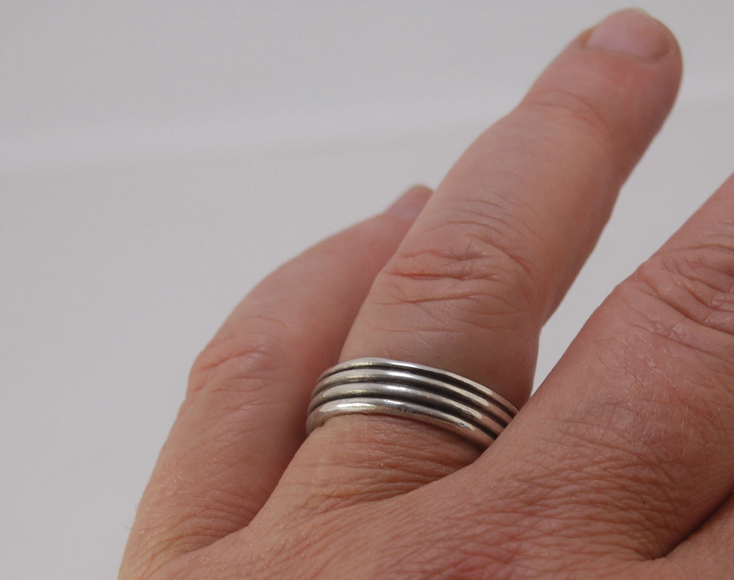 4 Rim Heavy Band 6mm wide - in Gold or Silver This is a heavy band cast from a wax carving turned on a lathe. These are so much fun to make! I have several different variations of this design.6mm wide and 2 mm thickThis ring is pictured in sterling silver