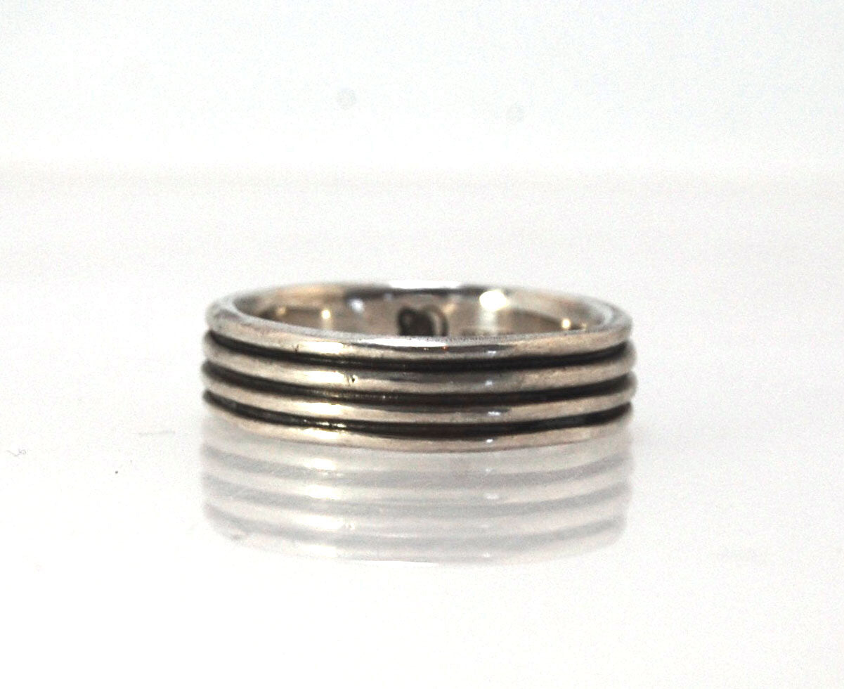 4 Rim Heavy Band 6mm wide - in Gold or Silver This is a heavy band cast from a wax carving turned on a lathe. These are so much fun to make! I have several different variations of this design.6mm wide and 2 mm thickThis ring is pictured in sterling silver