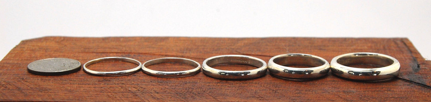 Superthin Half Round Plain Band - 1.3mm x 1mm wide in Gold or Silver Let me make you a ring! This half round plain band is milled in my studio and hand finished to your specificiations.This half round band ring is pictured in sterling silver, but can be m