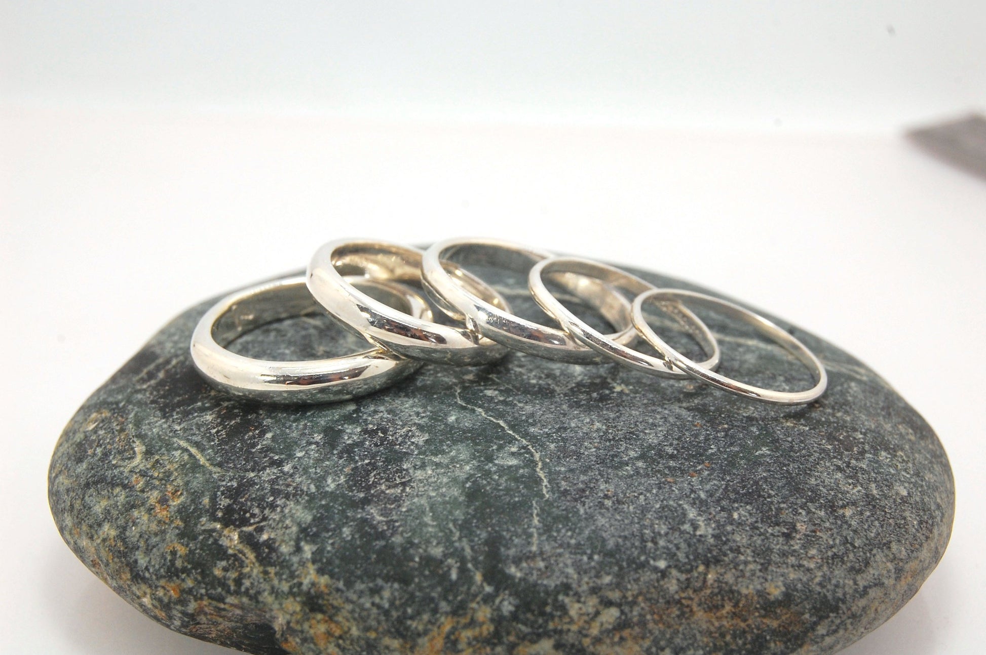 4mm Half Round Plain Band - 4mm wide x 1.8mm thick in Gold or Silver This half-round plain band is milled in my studio and hand-finished to your specifications. 4mm wide x 1.8 mm thick. This half-round band ring is pictured in sterling silver but can be c