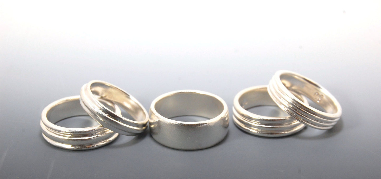 3 Rim Band -6.2mm wide - Sterling silver, 14k or 18k yellow gold This is a 3 rim band cast from a wax carving turned on a lathe and cast using the lost wax process. These are so much fun to make and I have several variations of different rims and widths a