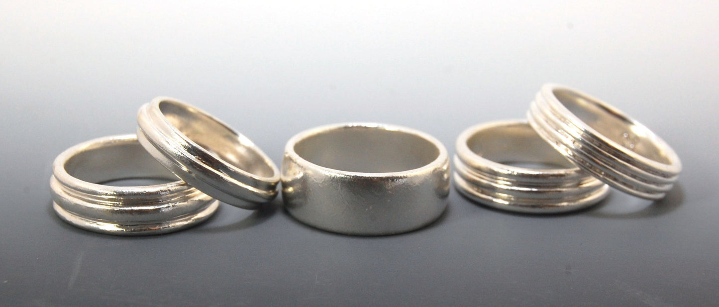 3 Rim Band -6.2mm wide - Sterling silver, 14k or 18k yellow gold This is a 3 rim band cast from a wax carving turned on a lathe and cast using the lost wax process. These are so much fun to make and I have several variations of different rims and widths a