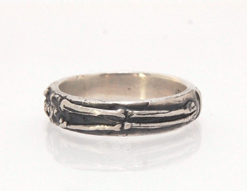 Oxidized Memento Mori Skeleton Ring - Wide 5.5m - Sterling SIlver This is the widest of my Memento Mori rings at 5.5mm wide. The skeleton spans the majority of the band, so I think the smallest I can make this ring without cutting off the design is a size