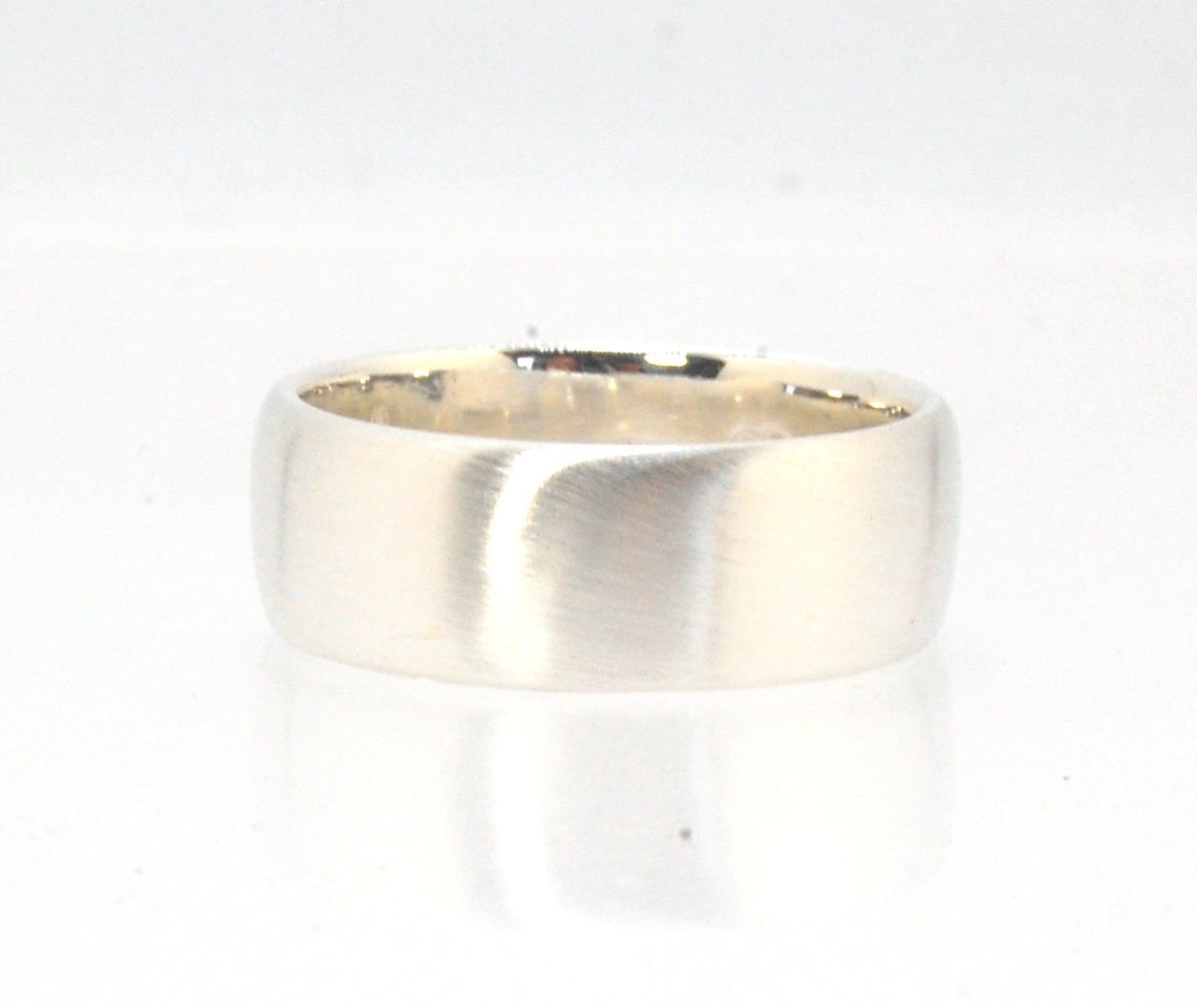 Real Wide Flat Half Round Band Ring in Sterling Silver This is a Real Wide Flat Half Round Band Ring cast from a wax carving. 8mm wide and 2.5mm thick, this ring was turned on a lathe in wax and cast using the lost wax process. These are so much fun to ma