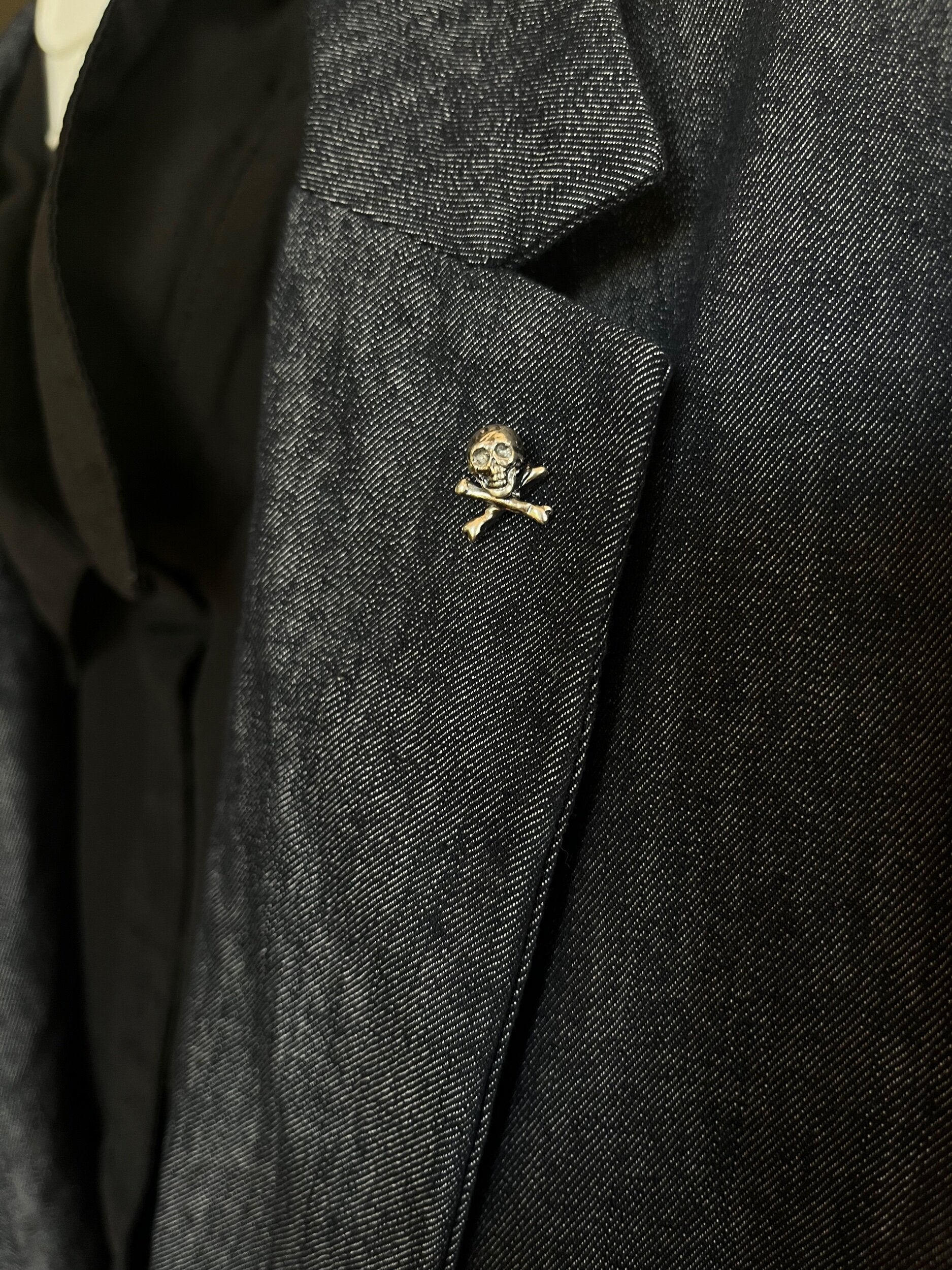 Skull & Bones Tie Tack Lapel Pin This solid sterling silver Skull & Bones tie tack label pin is wax carved by hand and cast using the ancient process of Lost Wax in sterling silver. I then made a mold, which I can inject with wax and make wax copies of th