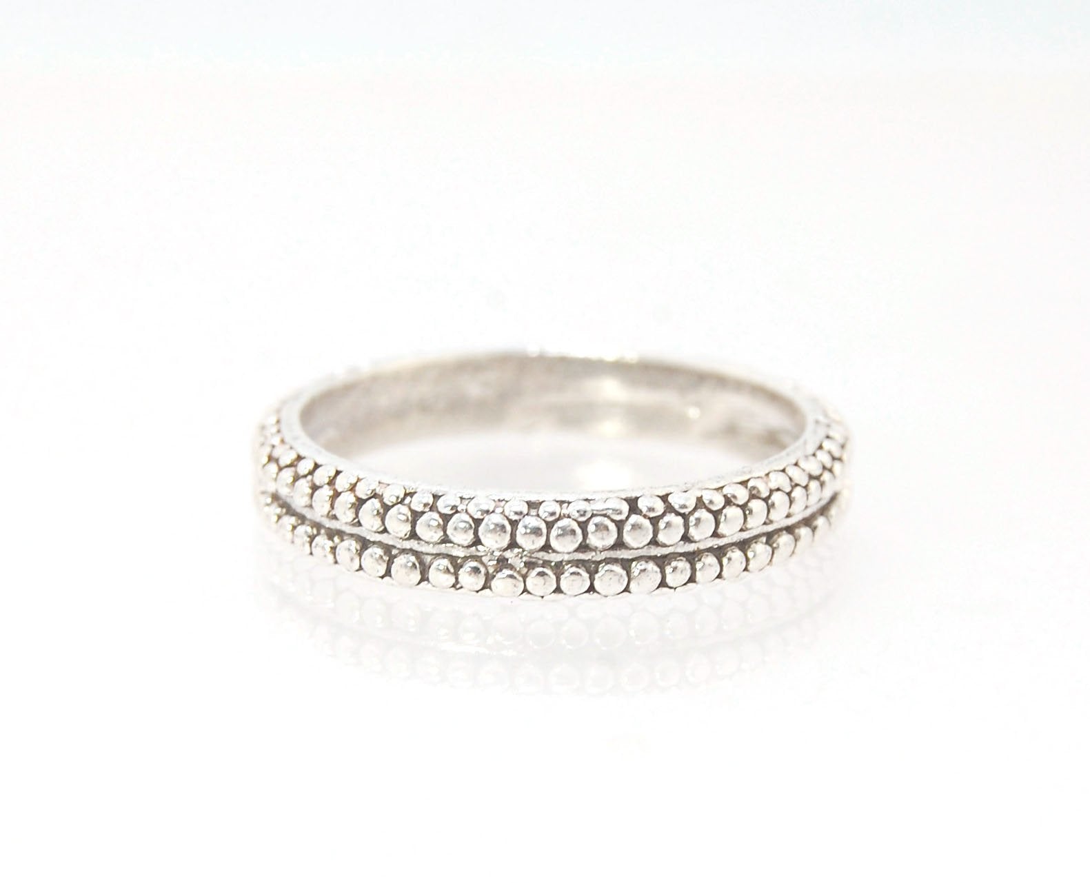 Double Row Granulation Band - Cast in Sterling Silver This is cast from a granulated original and is pictured here in Sterling Silver, but I can also cast this in 14k or 18k yellow gold. Or would be happy to make a similar design for you in original 18k g