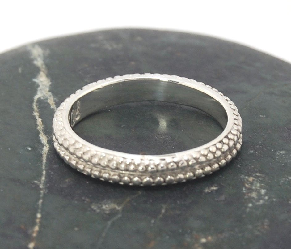 Double Row Granulation Band - Cast in Sterling Silver This is cast from a granulated original and is pictured here in Sterling Silver, but I can also cast this in 14k or 18k yellow gold. Or would be happy to make a similar design for you in original 18k g