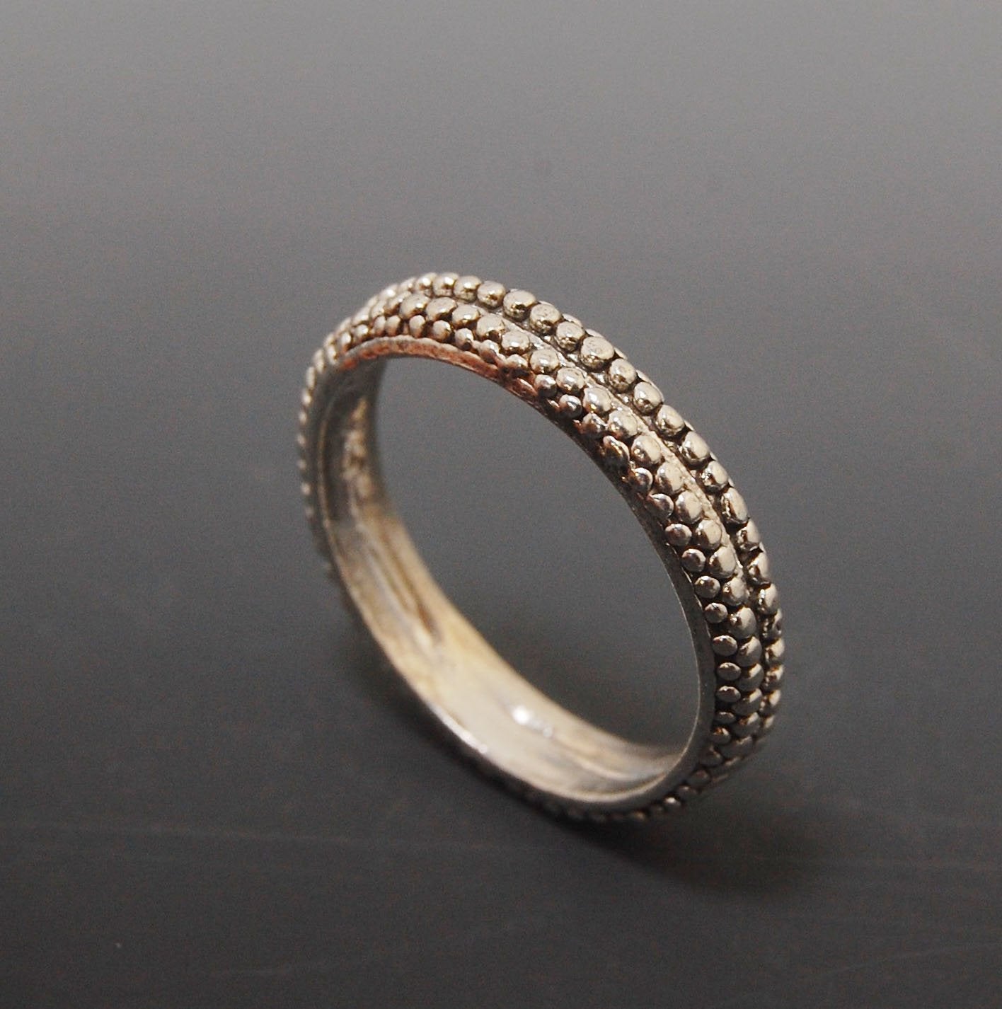 Double Row Granulation Band - Cast in Sterling Silver This is cast from a granulated original and is pictured here in Sterling Silver, but I can also cast this in 14k or 18k yellow gold. Or would be happy to make a similar design for you in original 18k g