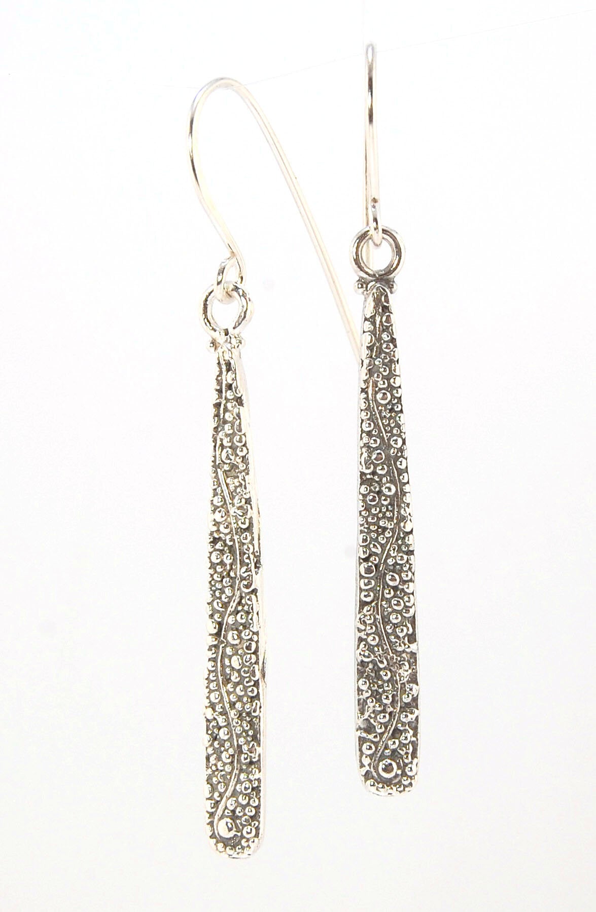 Seaweed Dangles - Long Earrings These seaweed dangle have terrific movement and sparkle. These are cast versions of my original granulation work, which is then molded for repeat waxes and cast using the ancient Lost Wax Process. Granulation is an ancient