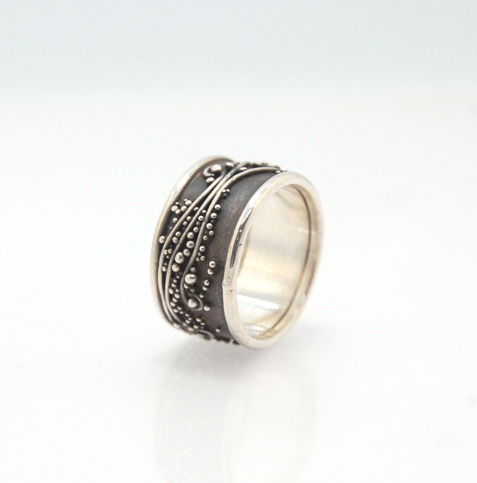 Waves Fine Silver Granulation Ring 11mm wide - PBS RING This is very similar to the ring I made during the segment of “A Craftsman’s Legacy” on PBS a few years ago. I am happy to make one for you in your size.Granulation is an ancient fusing process utili