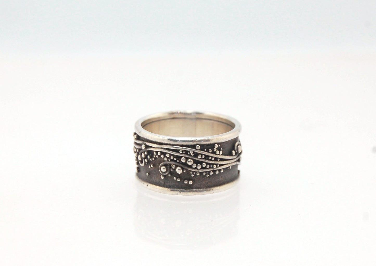 Waves Fine Silver Granulation Ring 11mm wide - PBS RING This is very similar to the ring I made during the segment of “A Craftsman’s Legacy” on PBS a few years ago. I am happy to make one for you in your size.Granulation is an ancient fusing process utili