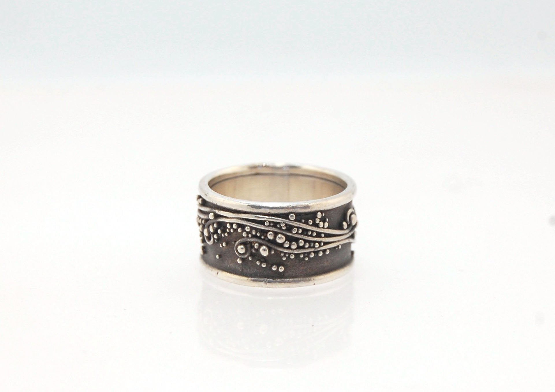 Waves Fine Silver Granulation Ring 11mm wide - PBS RING This is very similar to the ring I made during the segment of “A Craftsman’s Legacy” on PBS a few years ago. I am happy to make one for you in your size.Granulation is an ancient fusing process utili