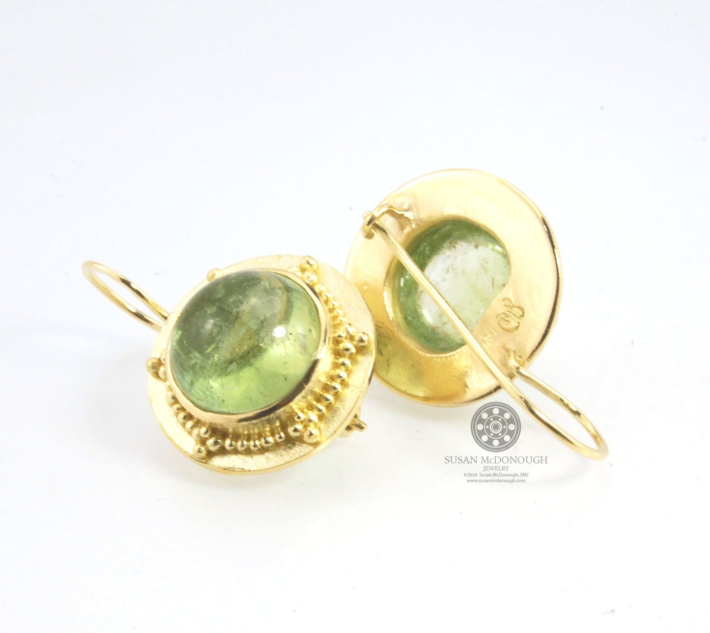 Green Bi-color Tourmaline 18k Gold Granulation Earrings These Green Bi-color Tourmaline 18k Gold Granulation Earrings are Classically-inspired 18k granulation. With 2 luminous and clear bi-color tourmaline cabochons bezel-set in 18k an accented ring of 18