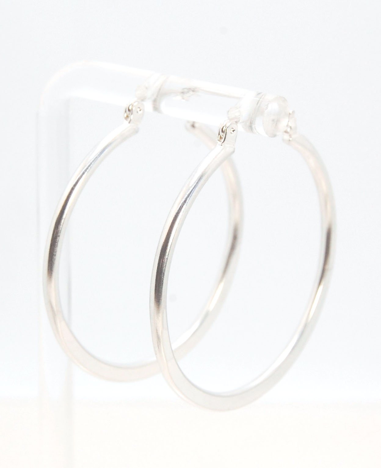 Hammer Forged Hoops - Large - Sterling These are Classic hammer-forged hoop earrings. These elegant hoops have a secure hoop catch with a satisfying snap. They are secure, lightweight and comfortable enough to wear everyday! You may even sleep in them!The