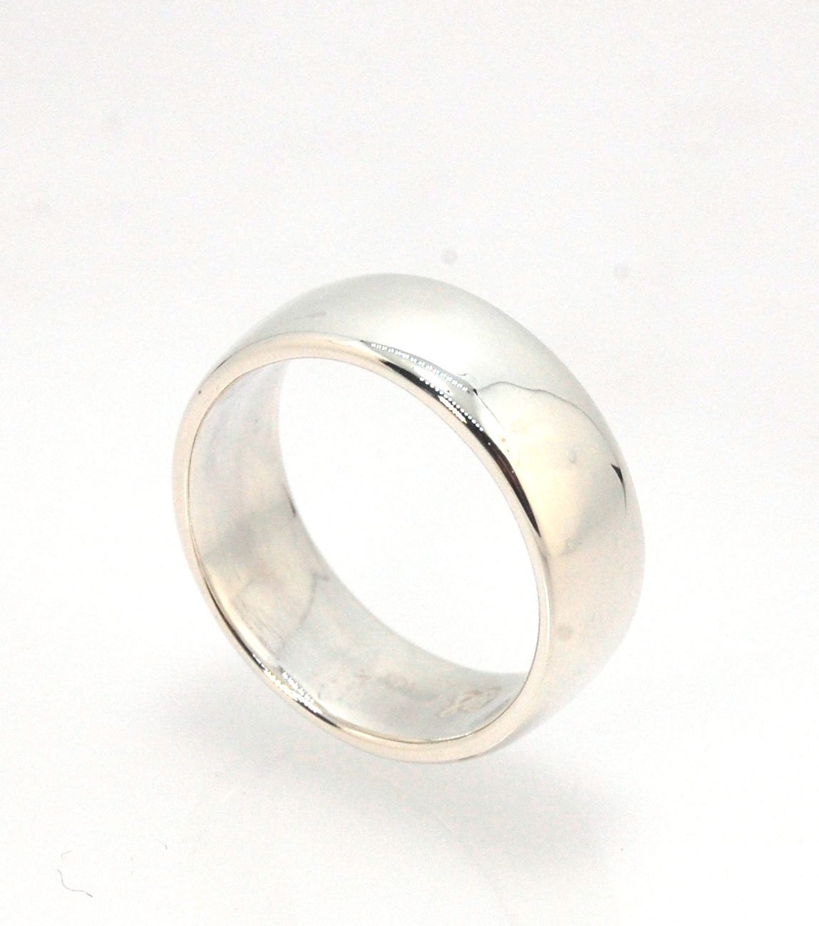 Real Wide Flat Half Round Band Ring in Sterling Silver This is a Real Wide Flat Half Round Band Ring cast from a wax carving. 8mm wide and 2.5mm thick, this ring was turned on a lathe in wax and cast using the lost wax process. These are so much fun to ma