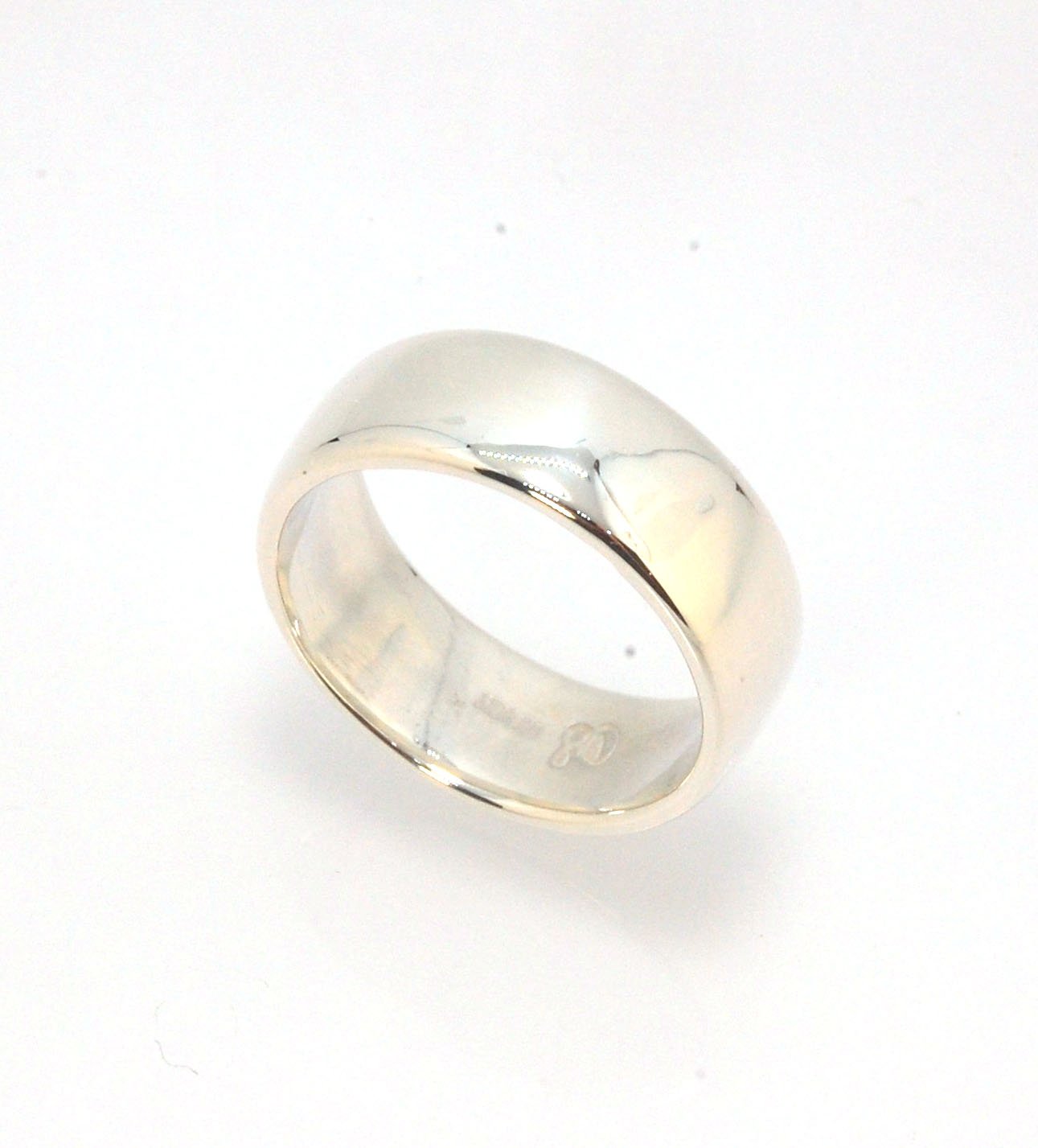 Real Wide Flat Half Round Band Ring in Sterling Silver This is a Real Wide Flat Half Round Band Ring cast from a wax carving. 8mm wide and 2.5mm thick, this ring was turned on a lathe in wax and cast using the lost wax process. These are so much fun to ma