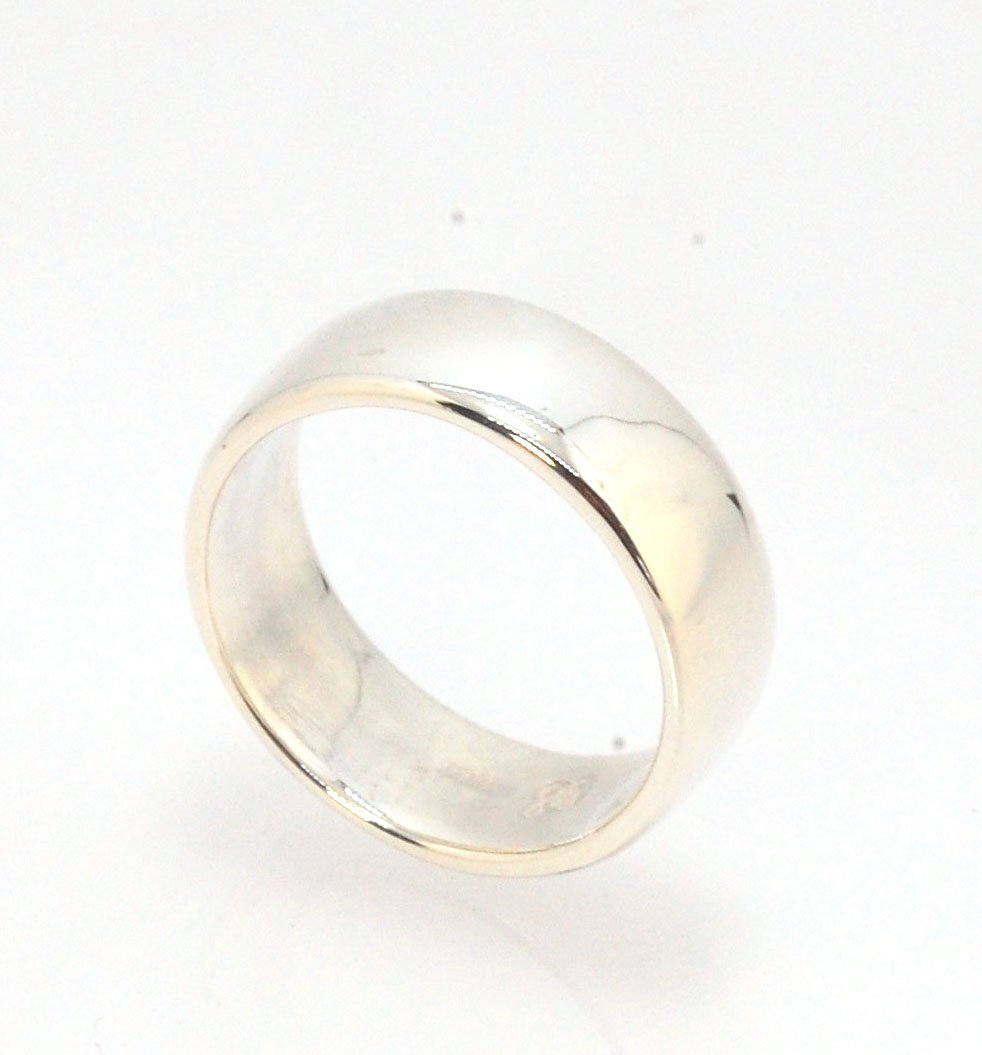 Real Wide Flat Half Round Band Ring in Sterling Silver This is a Real Wide Flat Half Round Band Ring cast from a wax carving. 8mm wide and 2.5mm thick, this ring was turned on a lathe in wax and cast using the lost wax process. These are so much fun to ma