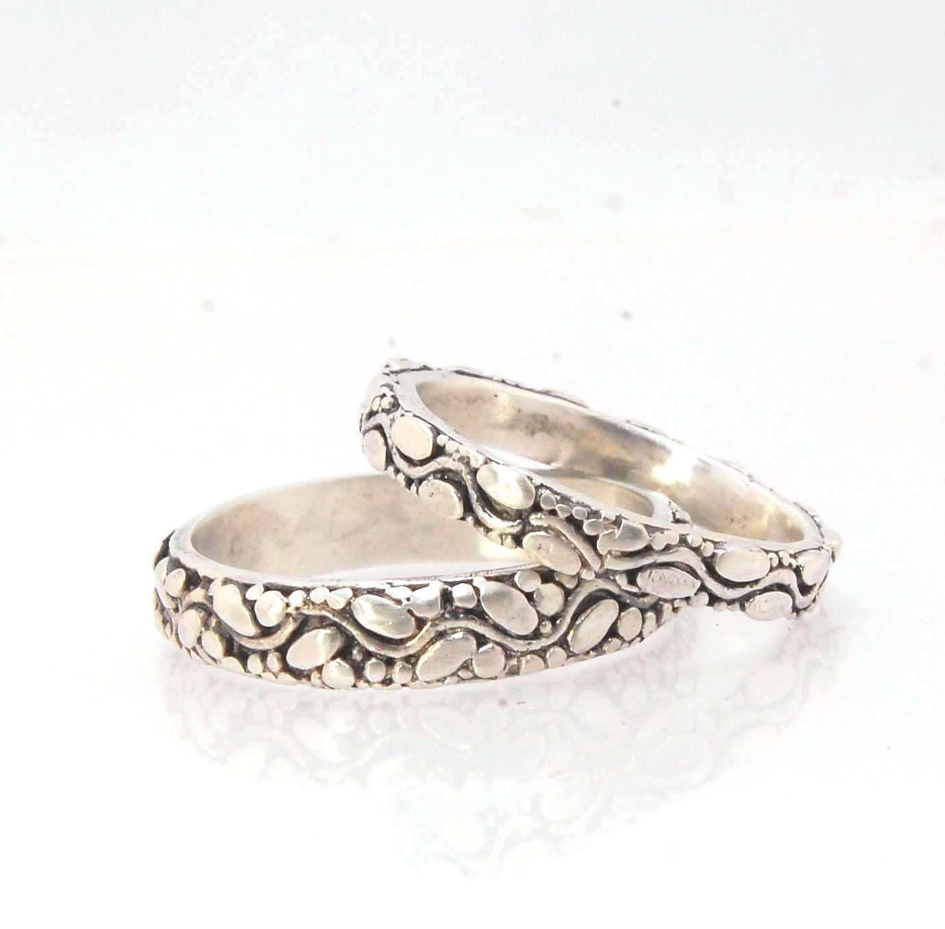 Oval Dot Pattern Band - 4.7mm - Order in any size -14k, 18k, Fine Silver or Sterling This is a 4.7 mm wide patterned band with ovals and heavy granules around a wavy center line.This is a cast version of a fun wavy patterned band with ovals and larger gra