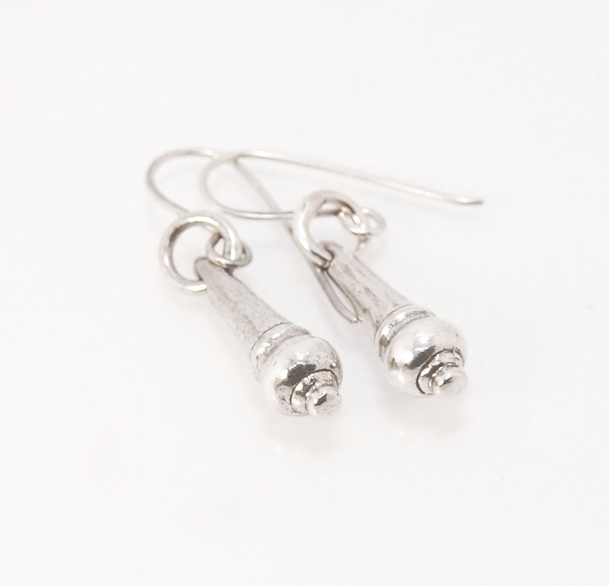 MET Drop Dangles in Sterling A play on an ancient Roman pair of Earrings I saw at the MET, these cast sterling dangle earrings have a great weight and terrific movement! I carved tthe original dangle from wax and then cast it using the Lost Wax process. T