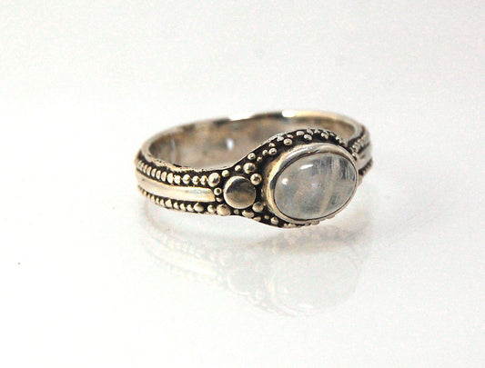 Rainbow Moonstone Fine Silver Asymmetrical Granulated Ring -size 8.5 This Moonstone cabochon is bezel-set in Fine Silver Granulation in a asymmetrical pattern.Granulation is an ancient fusing process utilized for thousands of years by the Etruscans and My