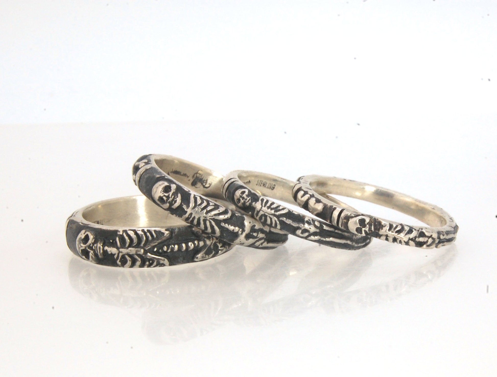 Oxidized Memento Mori Skeleton Ring - Wide 5.5m - Sterling SIlver This is the widest of my Memento Mori rings at 5.5mm wide. The skeleton spans the majority of the band, so I think the smallest I can make this ring without cutting off the design is a size