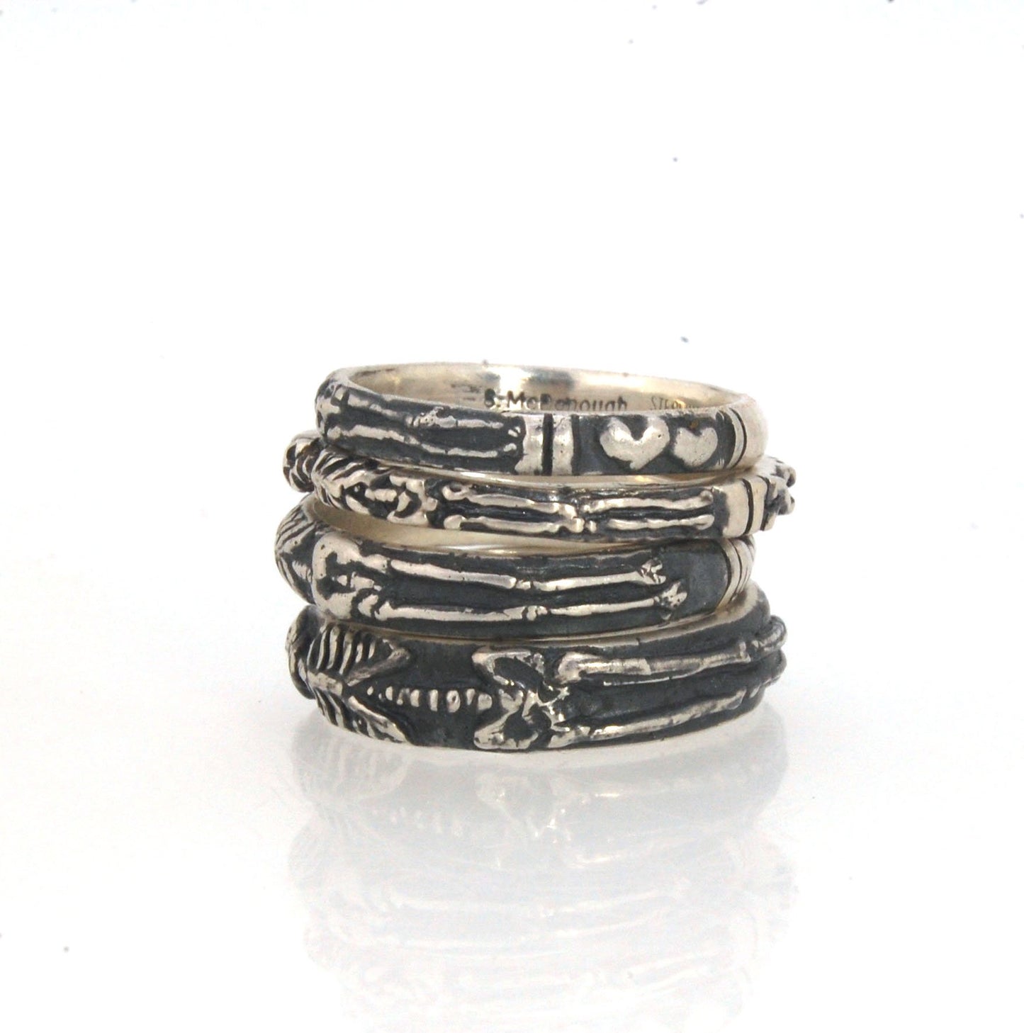 Oxidized Memento Mori Skeleton Ring - Wide 5.5m - Sterling SIlver This is the widest of my Memento Mori rings at 5.5mm wide. The skeleton spans the majority of the band, so I think the smallest I can make this ring without cutting off the design is a size