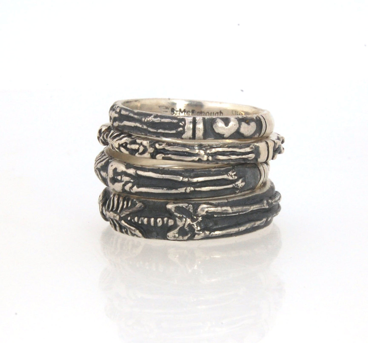 Oxidized Memento Mori Skeleton Ring - Wide 5.5m - Sterling SIlver This is the widest of my Memento Mori rings at 5.5mm wide. The skeleton spans the majority of the band, so I think the smallest I can make this ring without cutting off the design is a size